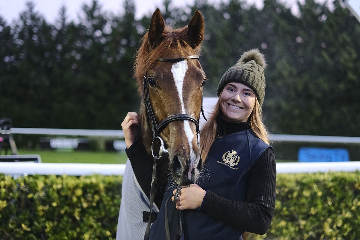 AZURE ANGEL with her groom, Beth Dixon, in the winner's enclosure.