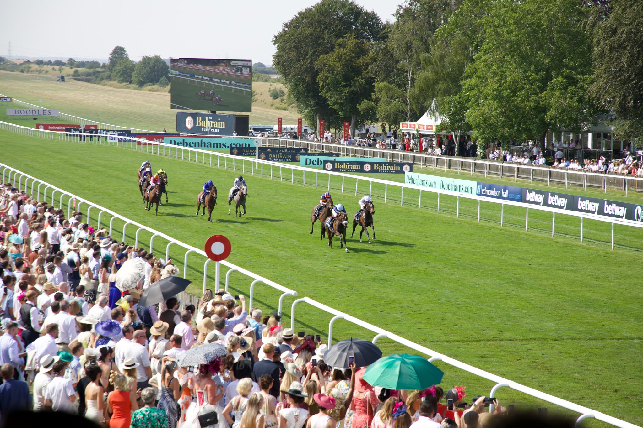 Scommessa Sicura gets her head in front during the Newmarket July Festival.